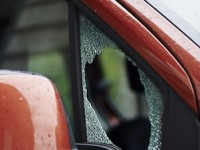 vandalized car smashed window