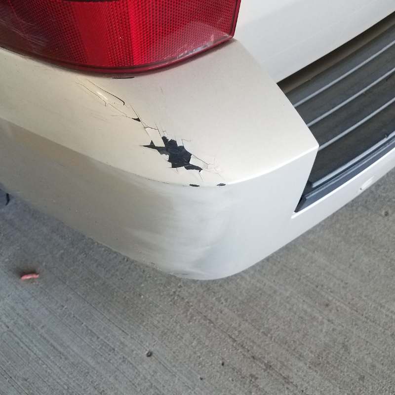 scratched white bumper