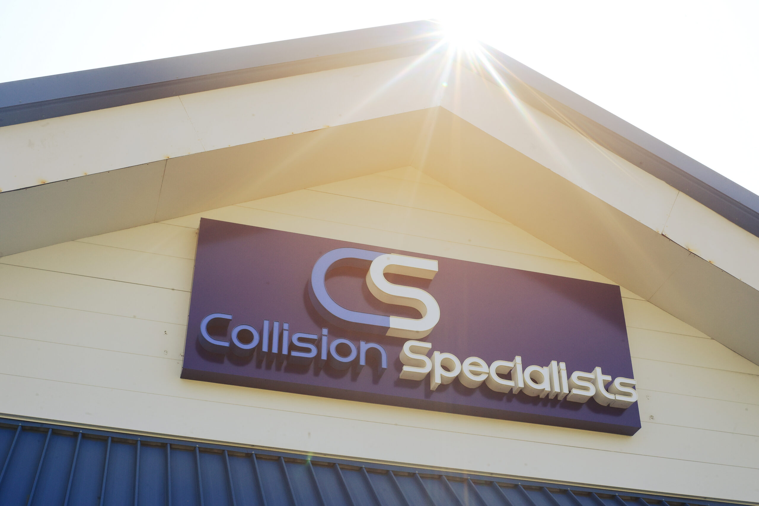 Building signage for Collision Specialists Tacoma location